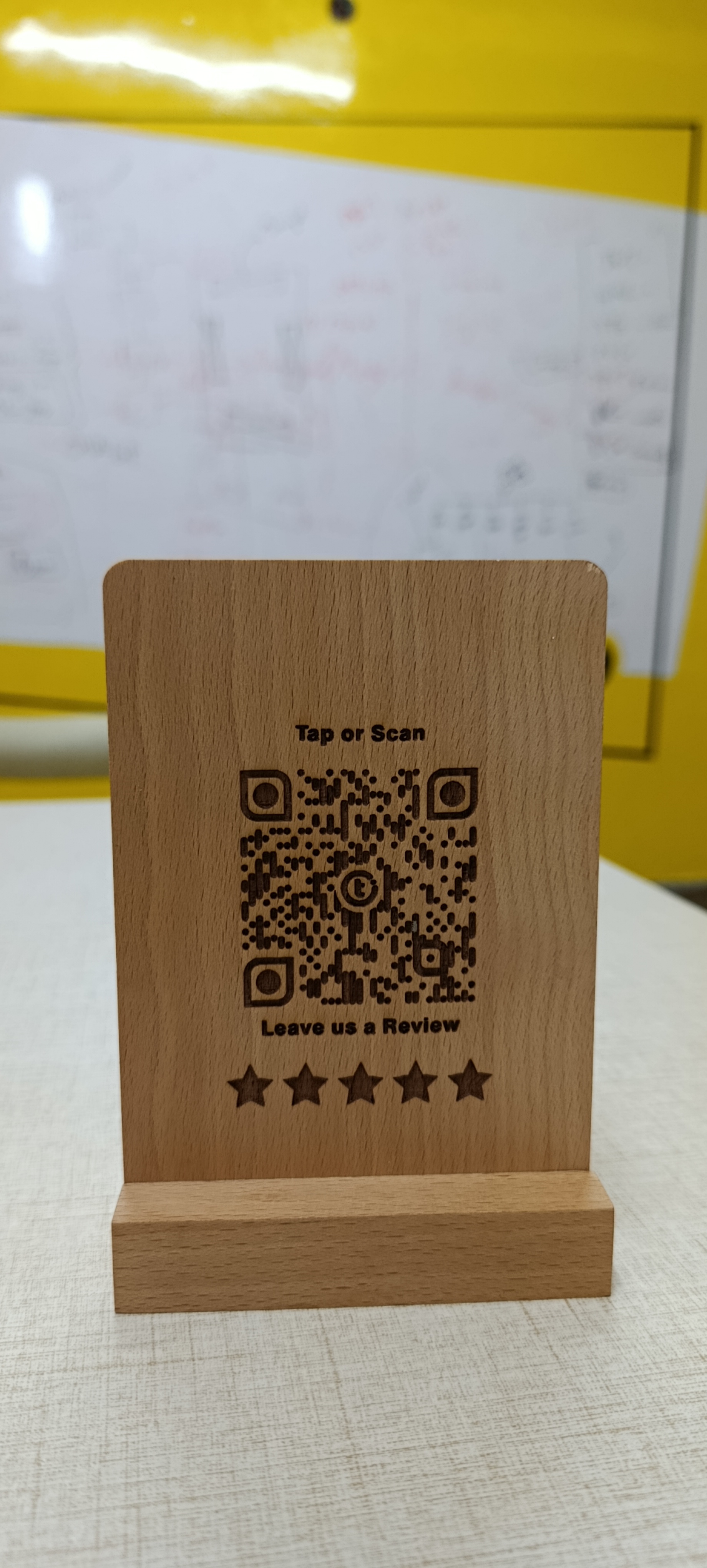 Review+ premium laser-engraved beechwood QR standee with Tap or Scan and Leave us a Review engraving