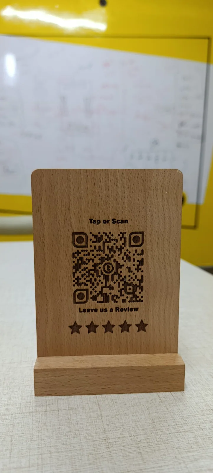 Review+ premium laser-engraved beechwood QR standee with Tap or Scan and Leave us a Review engraving